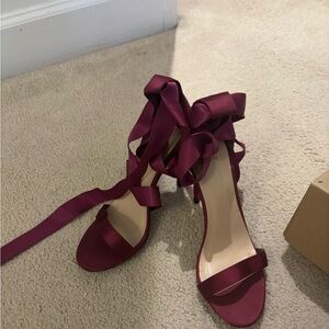 Size 7.5 satin burgundy tie open toe stilettos.
